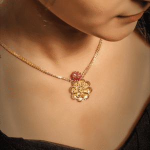 elegant gold necklace with floral pendant